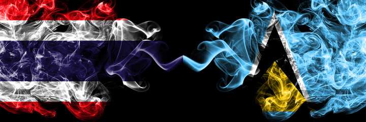 Thailand, Thai vs Saint Lucia smoky mystic flags placed side by side. Thick colored silky abstract smokes flags.