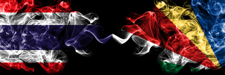 Thailand, Thai vs Seychelles, Seychellois smoky mystic flags placed side by side. Thick colored silky abstract smokes flags.