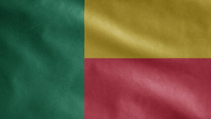 Beninese flag waving in the wind. Close up of Benin banner blowing, soft silk.