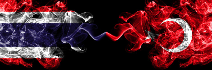 Thailand, Thai vs Turkey, Turkish, Turk smoky mystic flags placed side by side. Thick colored silky abstract smokes flags.