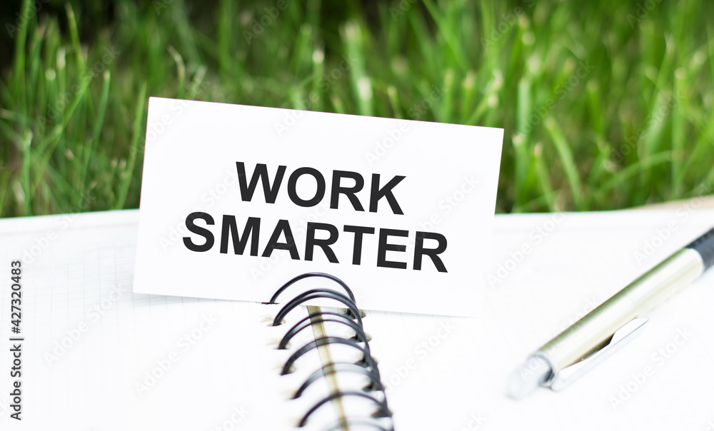 Poster inspirational and motivation life quote on paper note - work harder not smarter. white business card