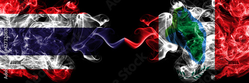 Thailand, Thai vs United States of America, America, US, USA, American, Cumberland Head, New York smoky mystic flags placed side by side. Thick colored silky abstract smokes flags.