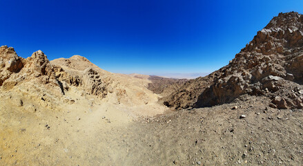 hiking trail in Eilat mountains. Red rock formations and boulders. Panoramic view over the trail on surrounding red mountains.
Eilat, Israel Israel, Eilat Mountains: Red Canyon