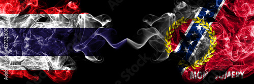 Thailand, Thai vs United States of America, America, US, USA, American, Montgomery, Alabama smoky mystic flags placed side by side. Thick colored silky abstract smokes flags.