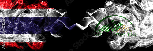 Thailand, Thai vs United States of America, America, US, USA, American, Morgan Hill, California smoky mystic flags placed side by side. Thick colored silky abstract smokes flags.
