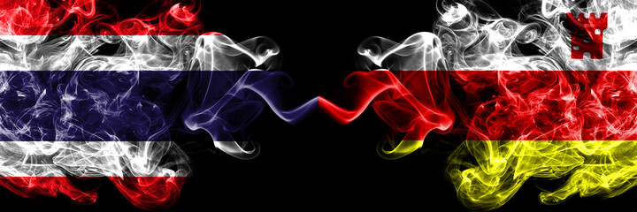 Thailand, Thai vs United States of America, America, US, USA, American, Santa Barbara, California smoky mystic flags placed side by side. Thick colored silky abstract smokes flags.