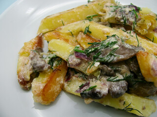 Fried potatoes with mushrooms mushrooms with sour cream and dill.