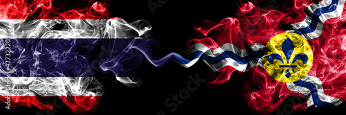 Thailand, Thai vs United States of America, America, US, USA, American, Saint Louis, Missouri smoky mystic flags placed side by side. Thick colored silky abstract smokes flags.