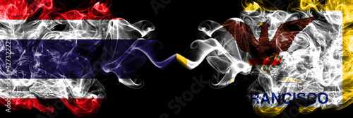 Thailand, Thai vs United States of America, America, US, USA, American, San Francisco, California smoky mystic flags placed side by side. Thick colored silky abstract smokes flags.