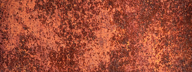Empty rusty corrosion and oxidized background, panorama, banner. Grunge rusted metal texture. Worn metallic iron wall