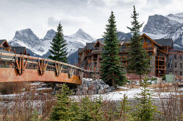 Canmore, wooden bridge over the Spring Creek & Rocky Mountains