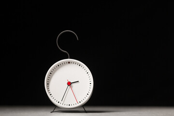 Alarm clock on a dark background.