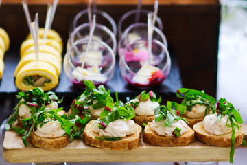Delicious snacks at the banquet. Catering on banquet.