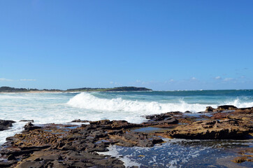 waves crashing on rocks