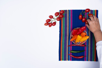 presentation of multicolored peppers, avocado on white backgrounds