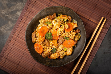 Yakisoba noodles. Yakisoba dish with meat, chicken and vegetables.