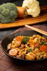 Yakisoba noodles. Yakisoba dish with meat, chicken and vegetables.