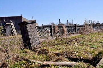 Fototapeta premium An ancient forked fence in an old abandoned city.