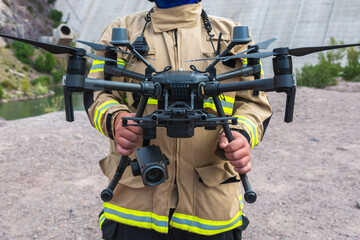 firefighter operating drone in search and rescue