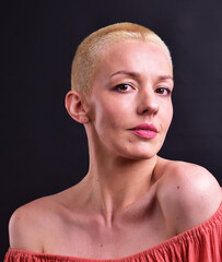 portrait of a beautiful woman with a shaved had