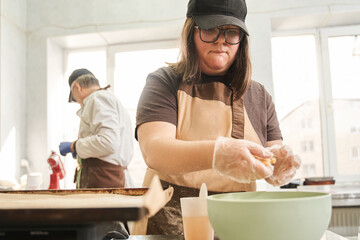 Serious baker sculpts and shapes cookies from the dough
