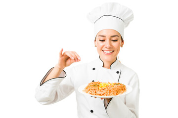Chef finishing the dinner of a customer at the kitchen restaurant