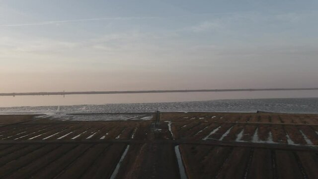 Beautiful Afternoon Sky Over Tidal Flat Of North Sea Near Husum In Germany
