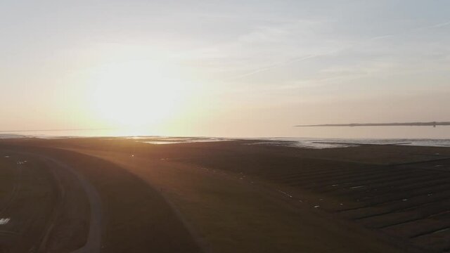Stunning Sunset Over Tidal Flat Of North Sea In Germany