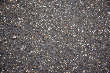 Dark background with stone texture.