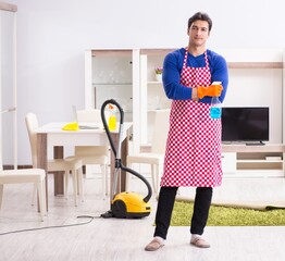 Contractor man cleaning house doing chores