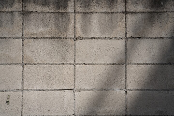 影の落ちるブロック塀,石壁,セメント,コンクリート,