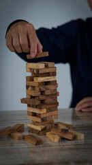 Risk Planning and Strategy in Business Gambling Business Place Wood Blocks on Tower Building Business Ideas.