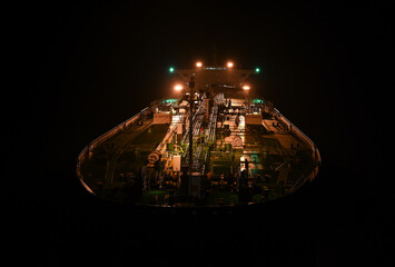 The tanker in the high sea at night