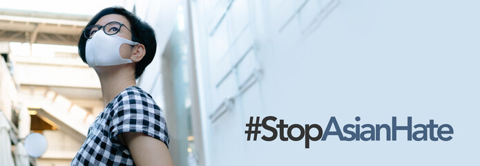 Stop asian hate, Anti-asian racism banner. An asian stylish woman wear medical face mask standing...
