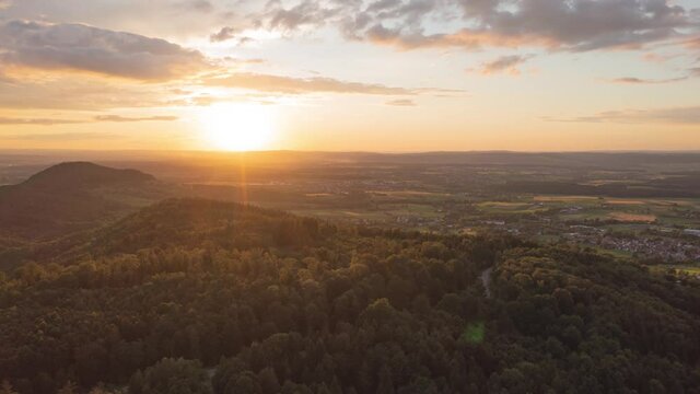 time lapse with a drone in the summer sunset at the albtrauf in the district of göppingen