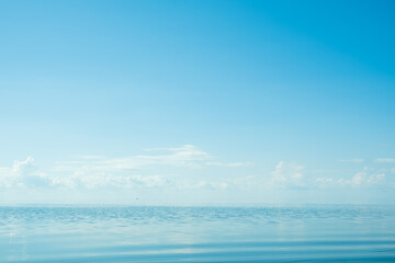 Fototapeta na wymiar The beautiful landscape of big calm blue lake. Sunny summer day.