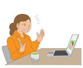 ノートパソコンでビデオ通話するシニア女性