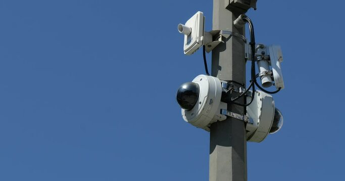 Outdoor security cameras on a pole for surveillance