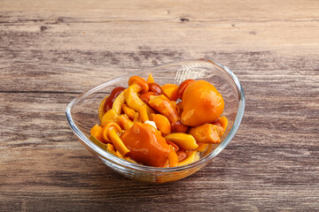 Marinated pickled honey mushrooms in the bowl