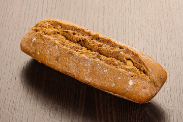 Crust tasty baguette over board