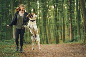 Portrait of a woman with her beautiful dog