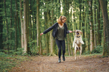 Portrait of a woman with her beautiful dog