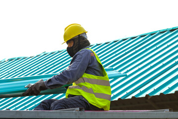 Glove roof construction roofing workers use metal sheets on house roofs.