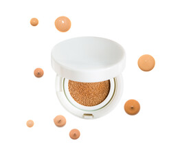 Powder cushion with drops of liquid make-up foundation texture multicolored. Cosmetic face powder isolated on white background.