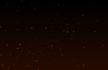 Beautiful abstract fire particles floating on dark background. Ember sparks flying up on a black backdrop. Creative concept of the burning flame. Graphic element for poster or banner design.