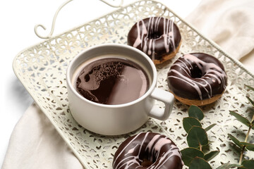 Tray with cup of coffee and donuts, closeup