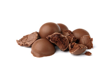 Broken chocolate praline candies isolated on white background.