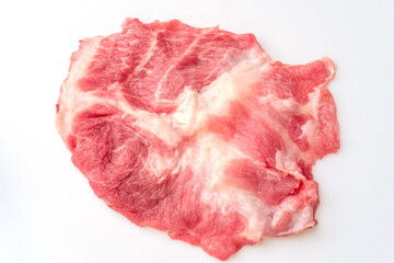 sliced raw pork shoulder meat isolated on white background. Top view. Flat lay