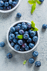 Fresh organic blueberries on stone background