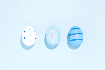 Easter eggs decorated painted minimal abstract concept sunny day